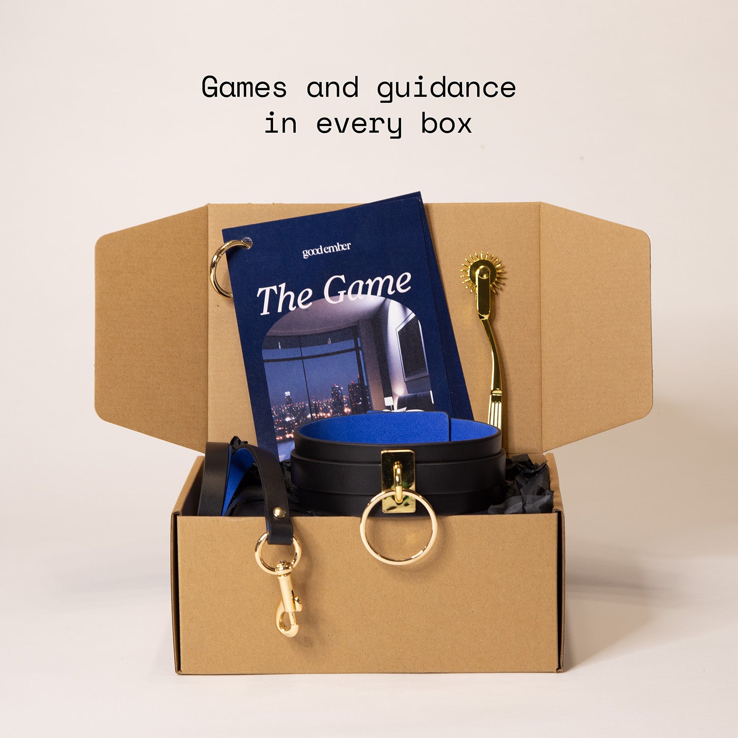 Open box containing a leather collar, a leather leash, a booklet and a whartenberg wheel. The quote reads 